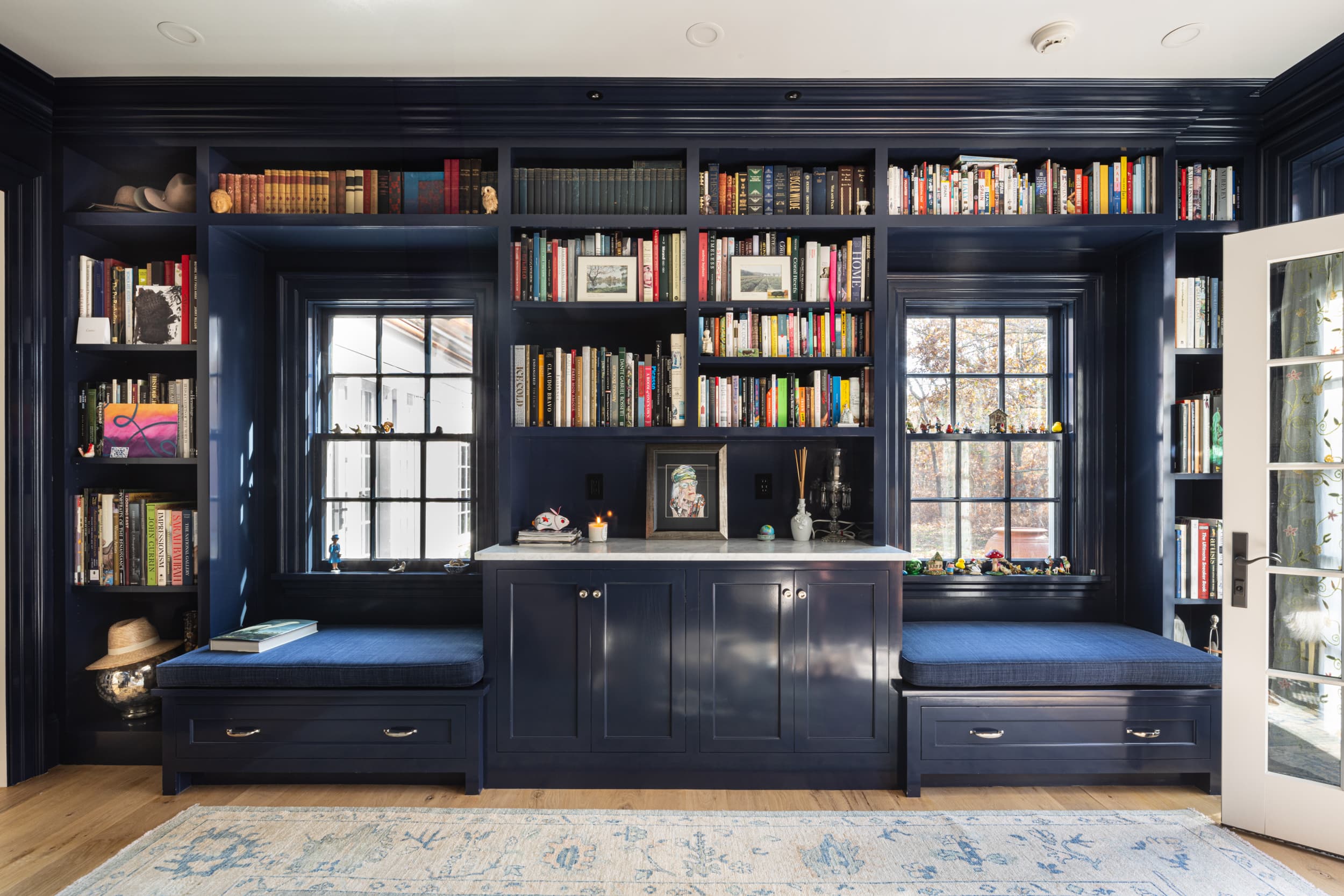 In-house library with in-built bookshelves and seating